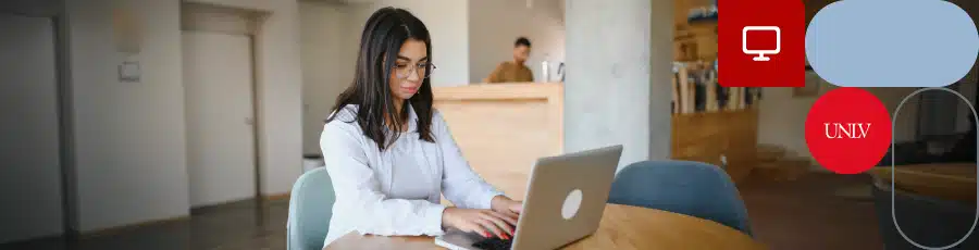 working on her computer reading about Overview of OSCP Certification